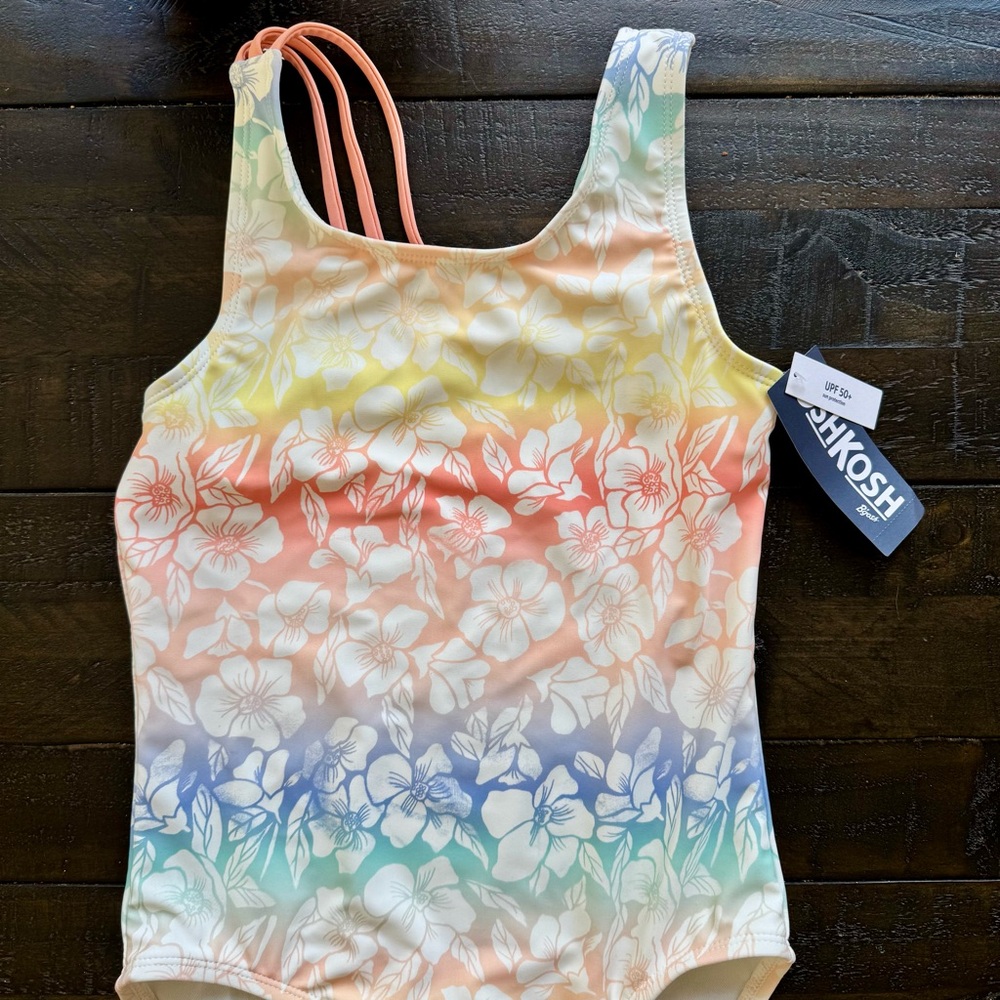 SOLD - NWT’s girls OshKosh one piece tropical swimsuit - size 8
